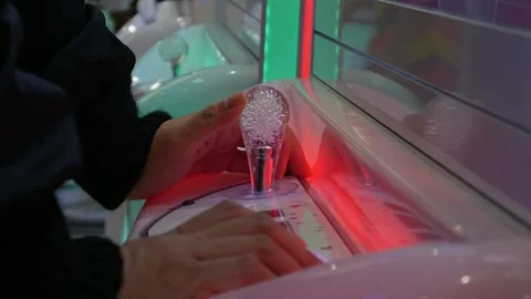 Playing a toy crawler crane machine joystick. Stock Footage 306315392