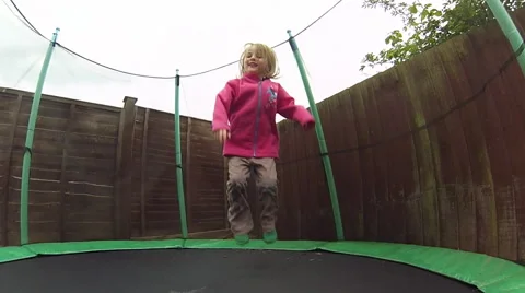 Playing on Trampoline Stock Footage 46726063