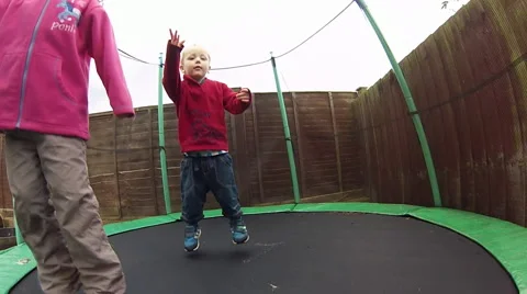 Playing on Trampoline Stock Footage 46726084
