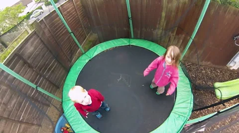 Playing on Trampoline Stock Footage 46726134