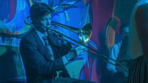 Playing a trombone and really enjoying it Stock Footage 112195895