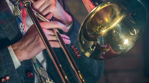 Playing trombone Stock Footage 112199546