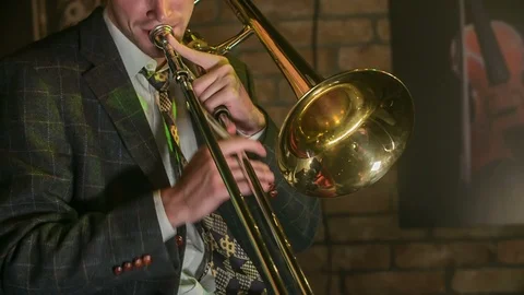 Playing a trombone Stock Footage 112199587