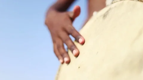 Playing tumba with black boy Stock Footage 79504871