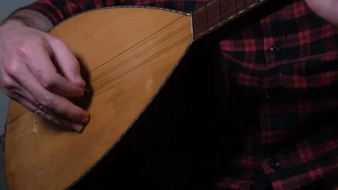 Playing turkish saz Stock Footage 228991573