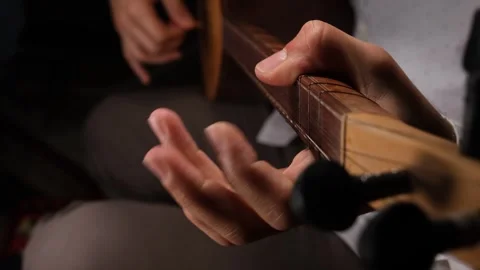 Playing turkish saz Stock Footage 240134053