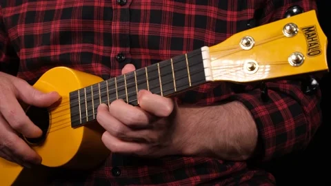 Playing ukulele close up Stock Footage 228992267