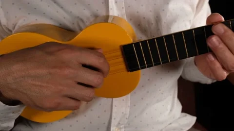 Playing ukulele close up Stock Footage 237635551
