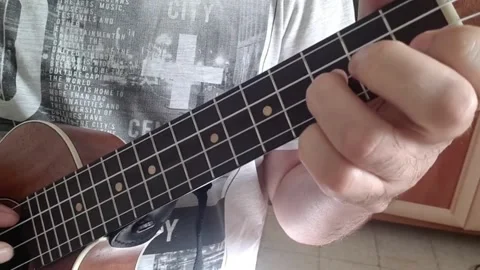 Playing Ukulele Vídeo Stock 150654390