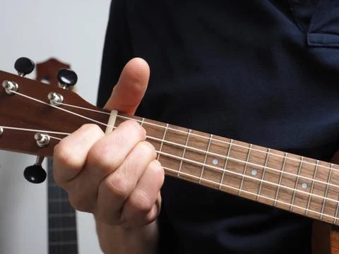 Playing an ukulele Stock Photos