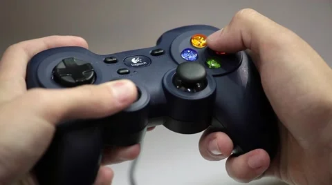 Playing video game with joystick Stock Footage 65482172