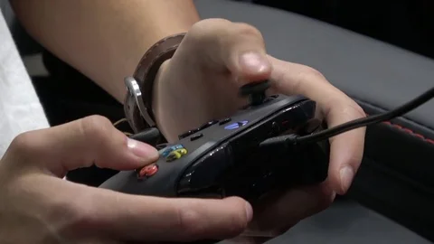 Playing video game with joystick Stock Footage 81011435
