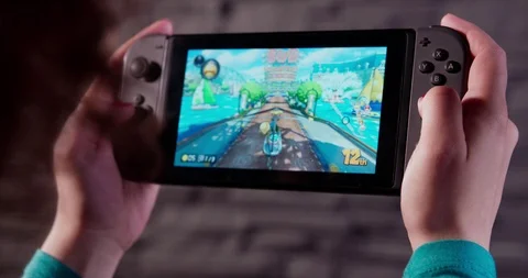 Playing video games on game console 動画素材 111006410