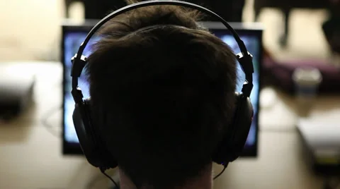 Playing VIdeogame Stock-Footage 31076955