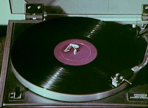 PLAYING A VINYL RECORD (1970's) Stock Footage 168919067