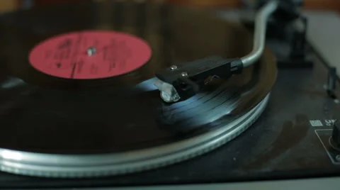 Playing a vinyl record on the gramophone. Close-up Video stock 58519306