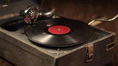 Playing vinyl records on a retro gramophone, potefone Stock Footage