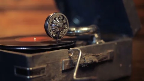Playing vinyl records on a retro gramophone, potefone Stock Footage 83202955