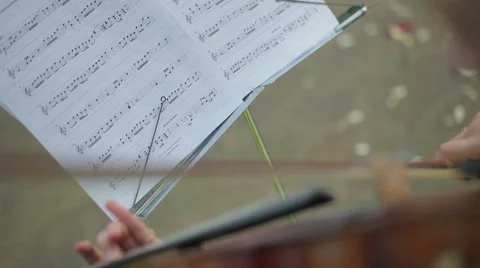 Playing the violin and notes Stock Footage 40635206