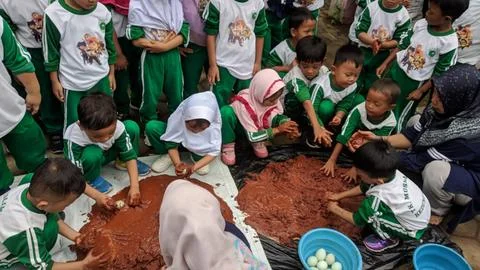 Playing while studying Foto stock