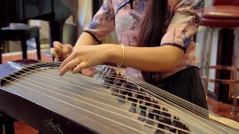 Playing zither Stock Footage 83228718