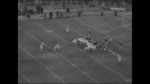 A playoff game between Baltimore Colts and the Green Bay Packers - 1965 Stock Footage 107365223