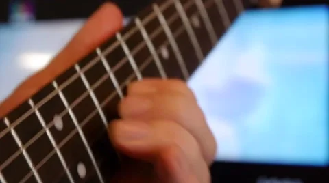 Plays guitar Stock Footage 47326336