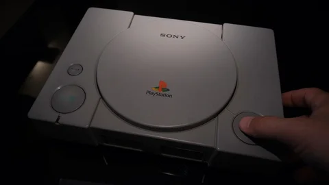 Playstation  1. PS1 game controller open Stock Footage 119945624