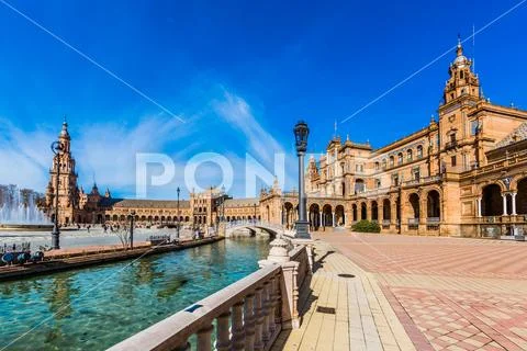 Plaza de Espana in Seville Spain with its imposing building and water Stock Photos