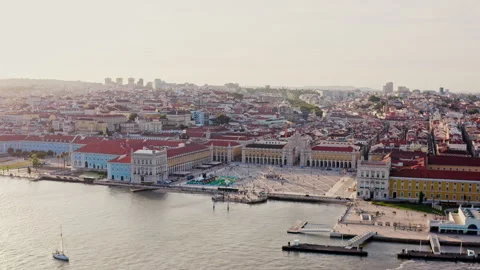 Plaza do Comércio and Tagus River in Lisbon, Portugal, at sunset. Golden hour. Stock Footage 262350371