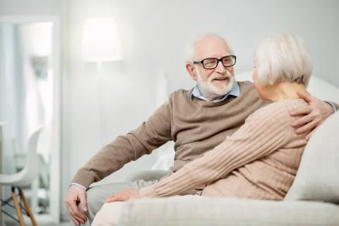 Pleasant aged man spending time with his wife Stock Photos