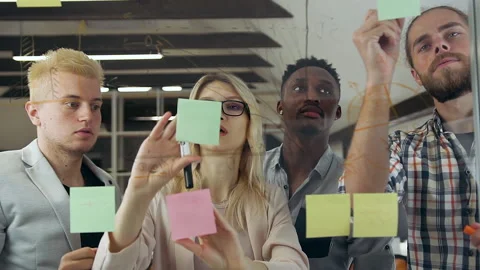 Pleasant enterprising creative professional diverse team analyzing business Stock Footage 133809284