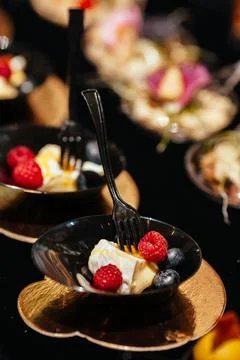 A pleasant evening with a delicious appetizer, a buffet table with appetize.. Stock Photos