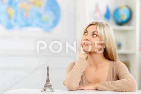 Pleasant girl planning her trip Stock Photos