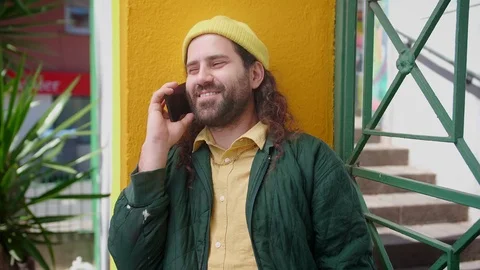 Pleasant Hispanic man talking online connected in new calling application using Stock Footage 108428277