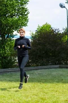 Pleasant running on the grass Stock Photos