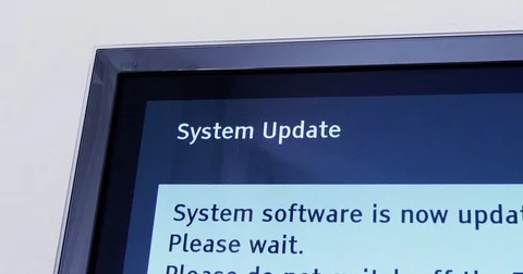 Please do not switch off your tv tv update Panasonic TV update Stock Footage 79403050