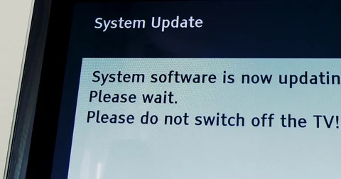 Please do not switch off your tv tv update Panasonic TV update Stock Footage 79403483