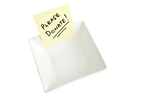 Please Donate A white bowl with a note asking people to Please Donate Copy... Stock Photos