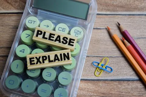 Please explain text stacked wooden cubes on the table. Stock Photos