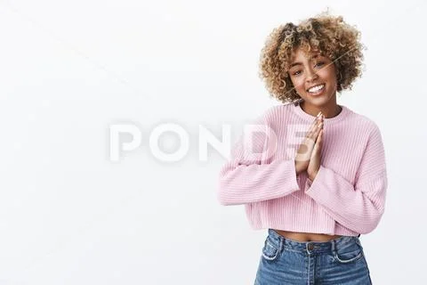 Please I beg you dearly. Portrait of cute and pretty charismatic young dark Stock Photos