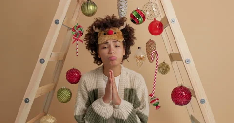 Please I need your help. Adorable young Afro American woman looks with pitty Stock Footage 144058175