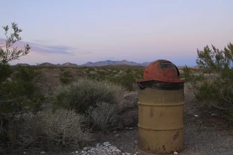 Please keep the desert clean using this trash can. Stock Photos