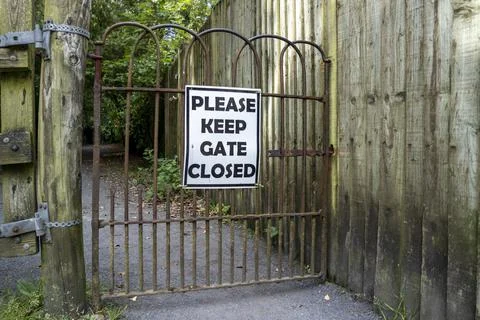 Please Keep Gates Closed Sign at iron gate in Ireland Stock Photos
