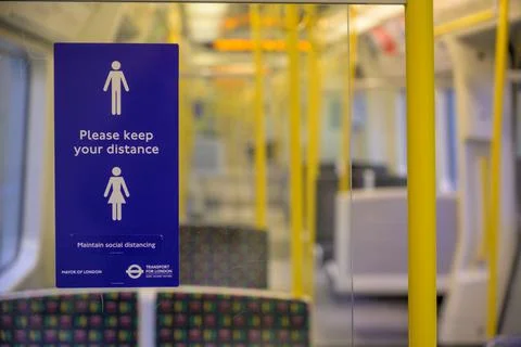 'Please keep your distance' sign Stock Photos