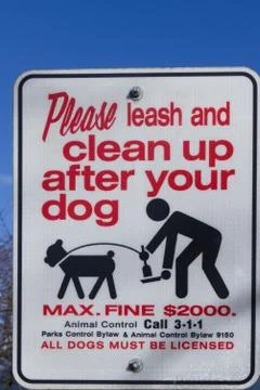 Please leash and clean up after your dog Stock Photos