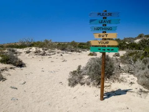 Please Leave Nothing But Your Footprints Sign Stock Photos
