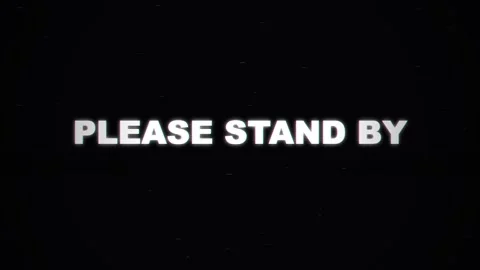 Please stand by text. Please stand by text with glitch effect on black Stock Footage 340550067