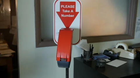 PLEASE TAKE A NUMBER MACHINE Stock-Footage 58953188