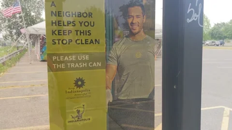 Please Use the Trash Can - IndyGo Bus Stop Sign Stock Footage 159497993
